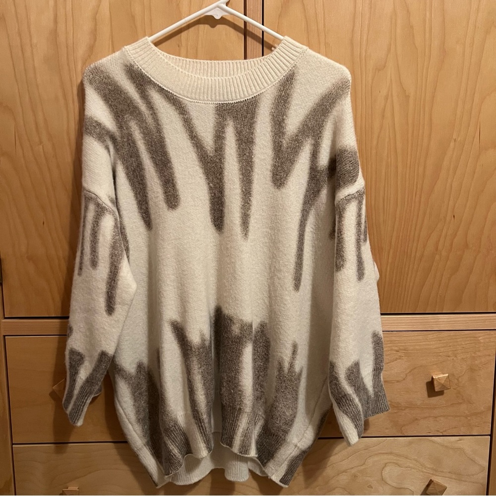 verge girl patterned graffiti sweater
